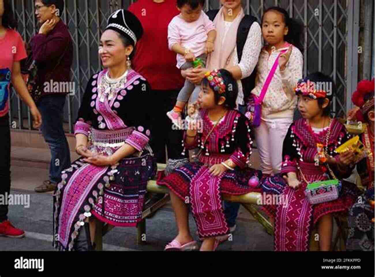 A Thai Family Dressed In Traditional Garments Merit: And Two Other Poems (Sonnets From Thailand)