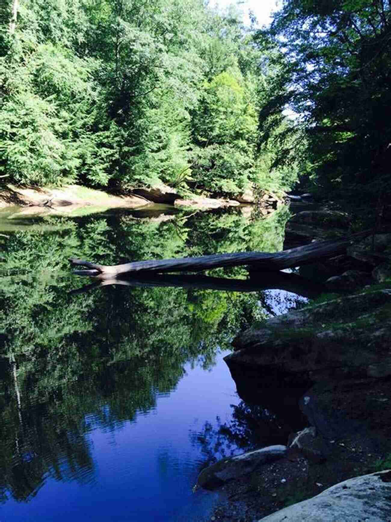 A Hiker Navigating The Rocky Terrain At McConnell's Mill State Park Best Hikes Near Pittsburgh (Best Hikes Near Series)