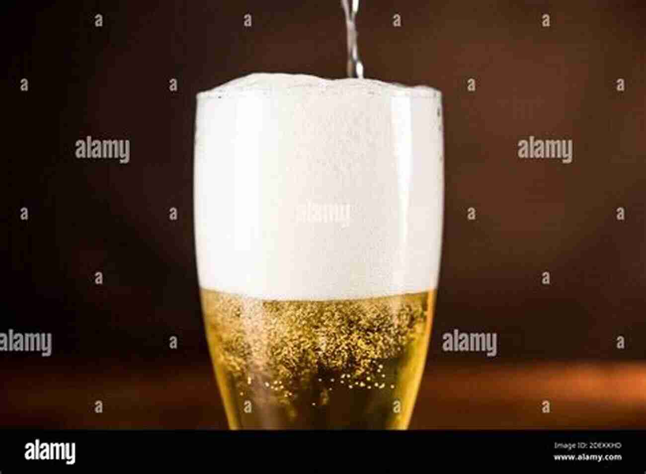 Frothy Golden Beer Pouring Into A Glass Froth : The Science Of Beer