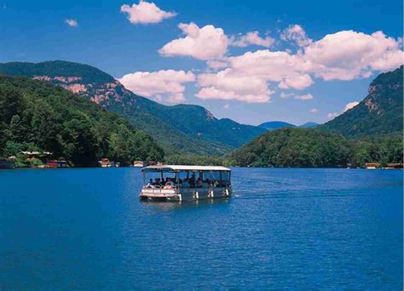 Lake Lure A Beautiful Blue Lake Surrounded By Lush Green Mountains And Clear Blue Sky Lake Lure (Images Of America)