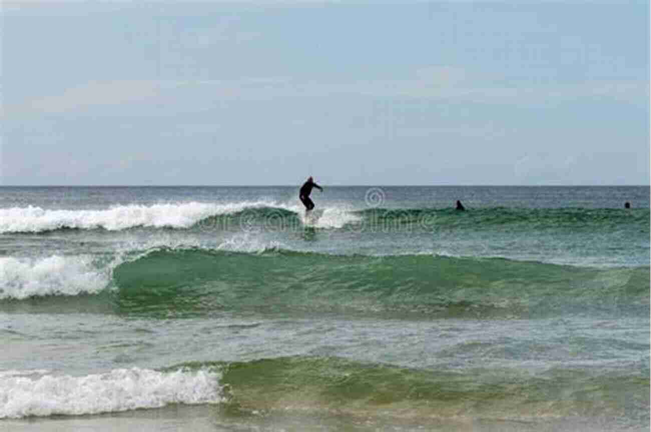 Surfers Catching Waves At Fistral Beach Surf UK: The Definitive Guide To Surfing In Britain