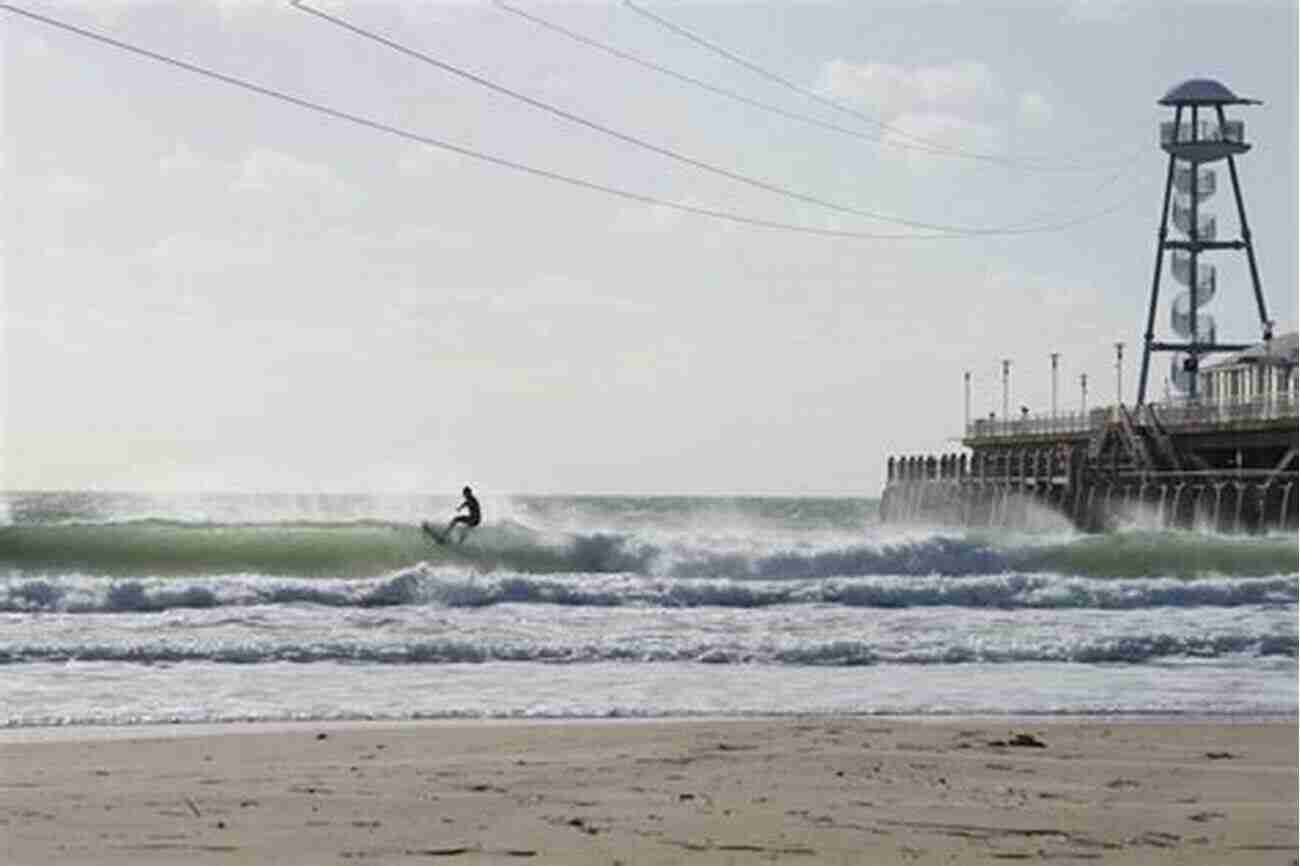 Surfers Enjoying The Waves At Bournemouth Beach Surf UK: The Definitive Guide To Surfing In Britain