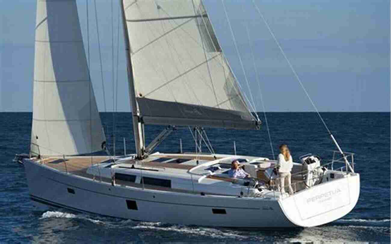 The Hanse 445 Sailboat Sailing Against A Stunning Sunset Twenty Comfortable Sailboats To Take You Coastal Cruising