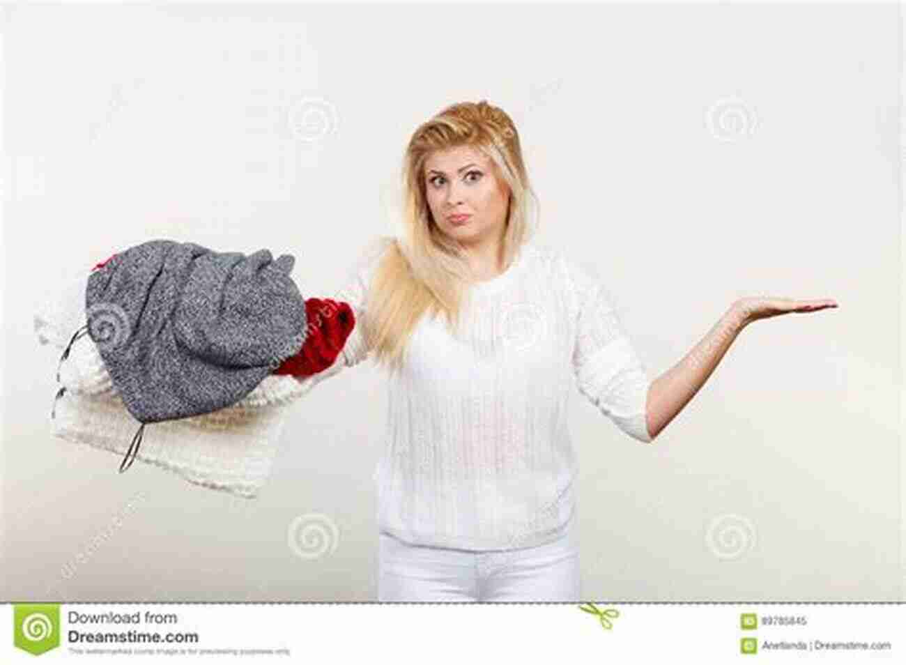 Woman Holding A Pile Of Clothes With A Confused Expression On Her Face A Dressed Up Mess (Addressing The Mess 1)